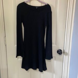 Black ribbed sweater dress.